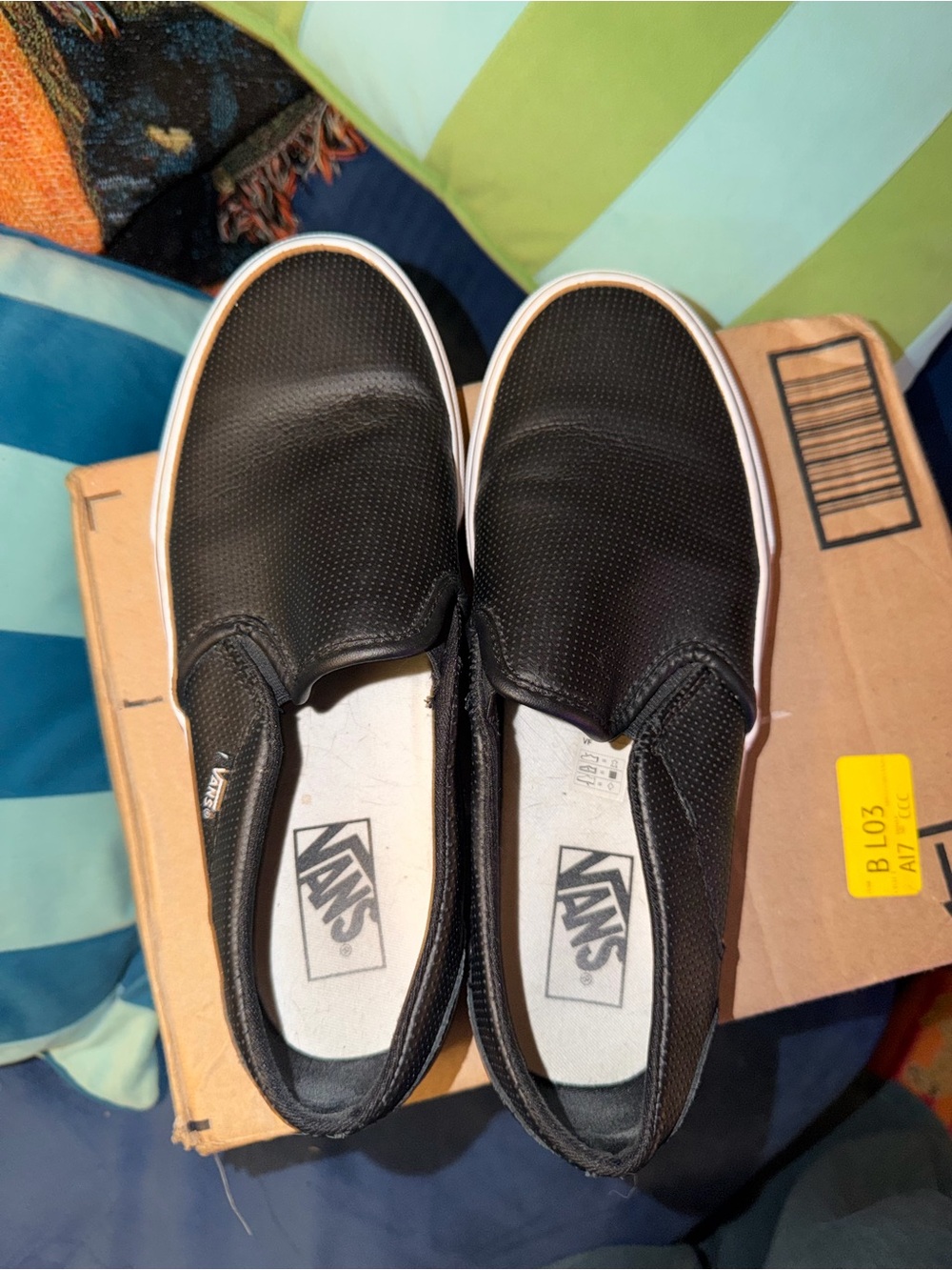 Vans Black Perforated Slip-Ons
